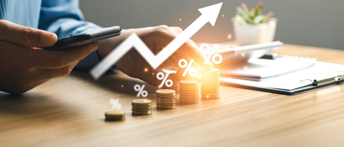 Interest rate and dividend concept, Businessman is calculating income and return on investment in percentage. income, return, retirement, compensation fund, investment, dividend tax, stock market